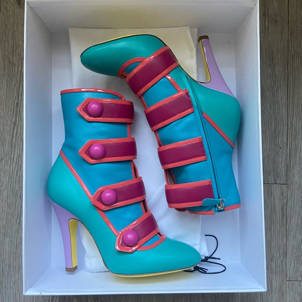 Moschino boots with original box, dust bag, and quality control number